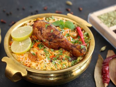 Chicken biryani Spicy Indian Malabar biryani Hyderabadi biryani, Dum Biriyani pulao golden bowl Kerala India Sri Lanka Pakistan basmati rice mixed rice dish with meat curry Ramadan Kareem, Eid
